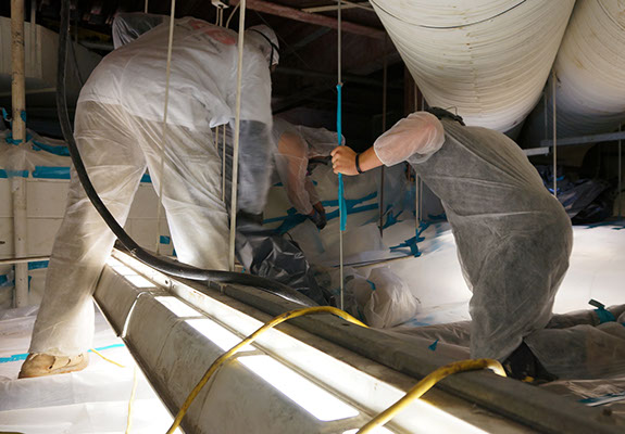 Asbestos Abatement in very tight quarters at the Peninsula Health Center in Newport News VA.