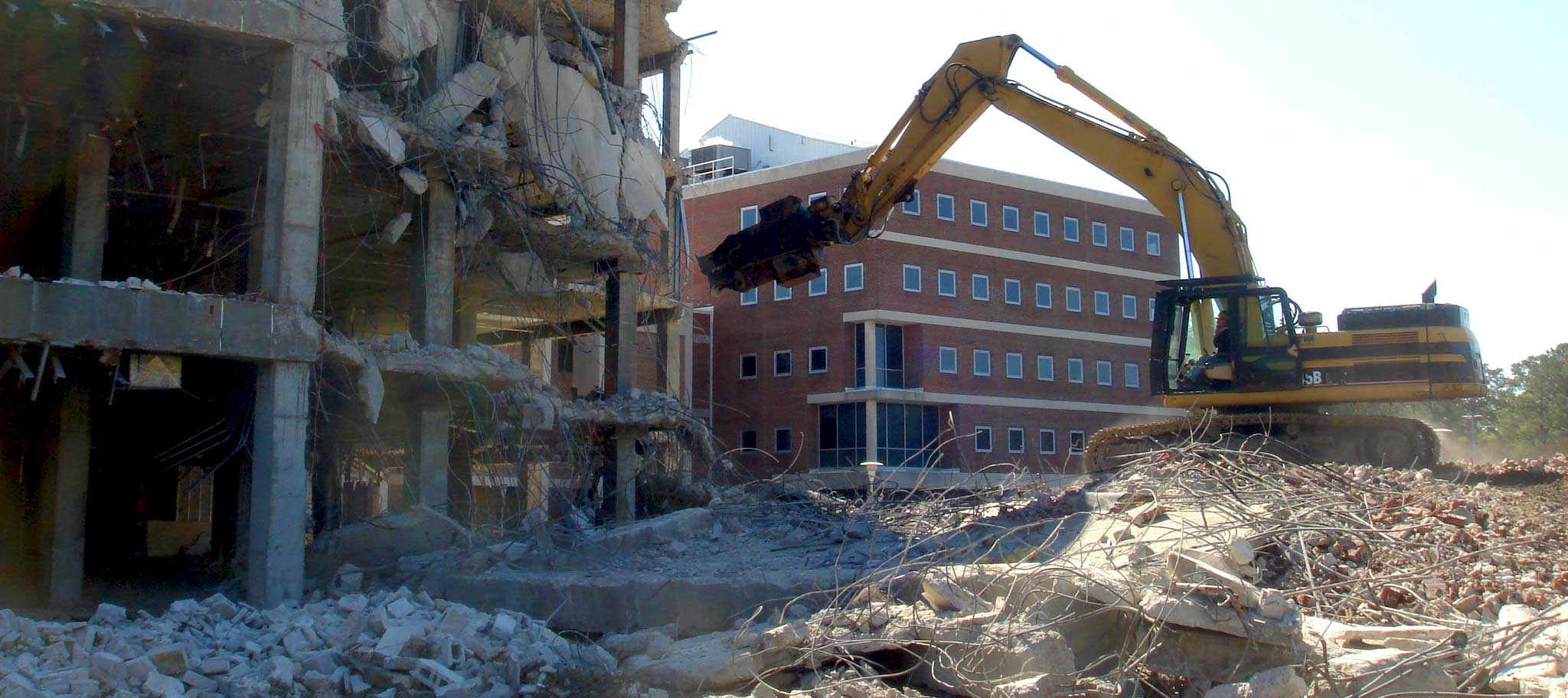 On-site before and after conversion showing building demolition and repurposed materials, DePaul Hospital, Norfolk VA